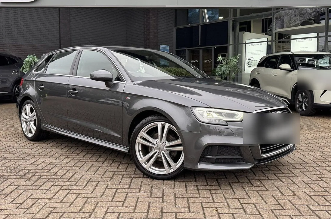 Before: a grey Audi A3 photographed on a brick forecourt